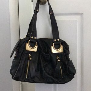 B. Makowsky black leather bag